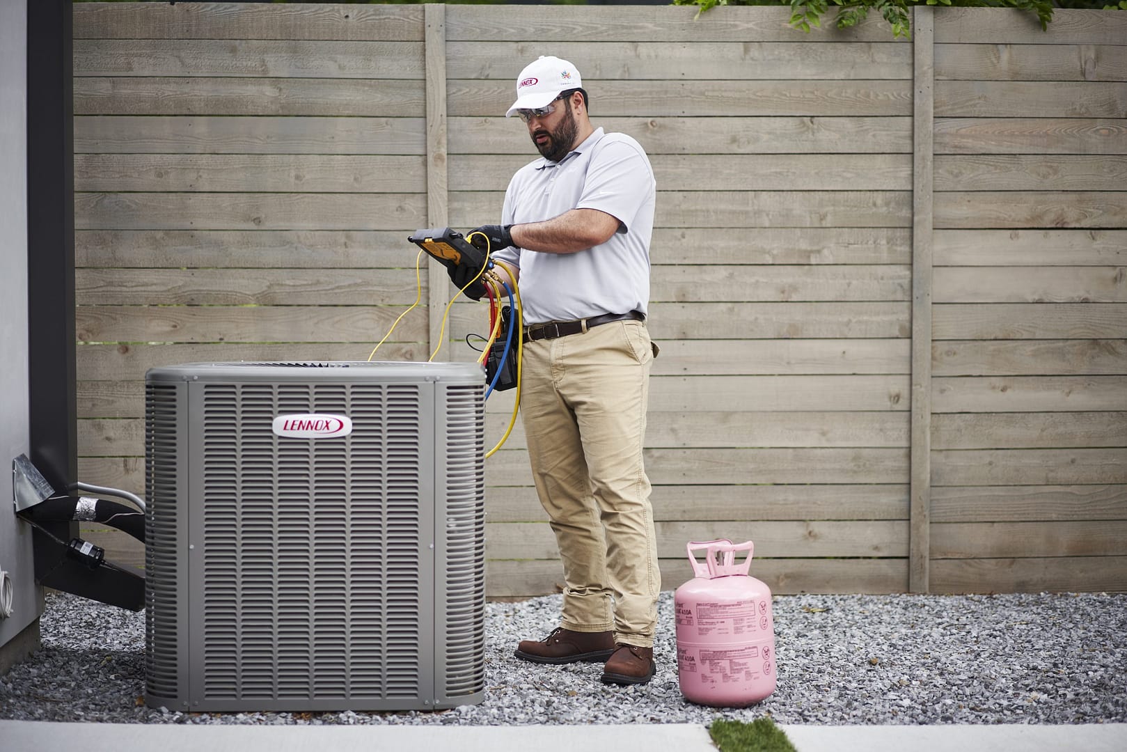 A Lennox HVAC Dealer inspecting a Unit